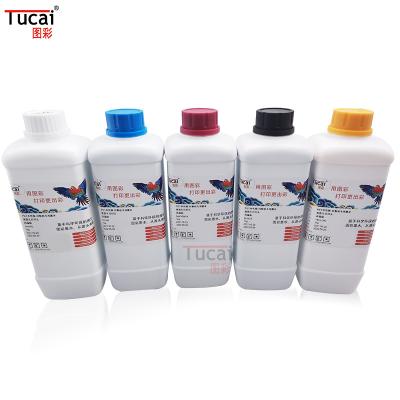 China DTF Tinta de pigmento a base de agua Tinta digital de pigmento Prensa térmica Tinta de impresión Tinta de película PET Impresión Tinta blanca en venta