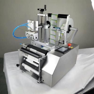 China Food round bottle labeling machine, semi-automatic double-sided labeling machine, food and drink labeling machine for sale