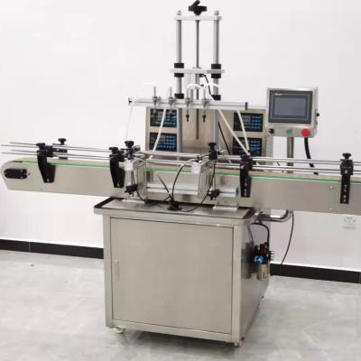 China Food Filling Machine Liquid Automatic Capping Labeling Machine for sale