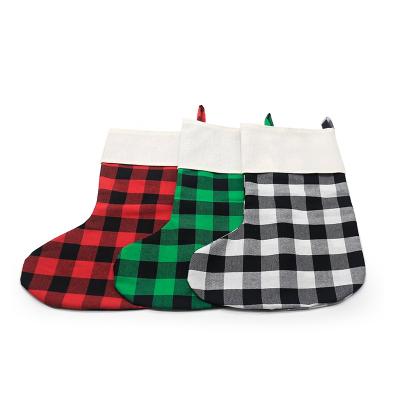 China Custom Printable Buffalo Plaid Canvas Christmas Stocking Blank Sublimation Christmas Stockings for sale