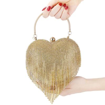 China Portable Luxury Rhinestone Tassel Diamond Bag Women Heart Shape Wedding Crystal Clutches Bag 2022 for sale