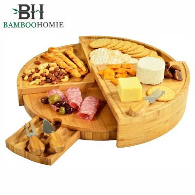 China Sustainable Bamboo Cheese Charcuterie Board With Knife Set Round Bamboo Cheese Board Set for sale