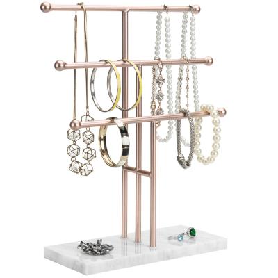 China China Custom Treated Natural Marble Base With Over-Layer Plated Gold Metal Jewelry Display Rack for sale