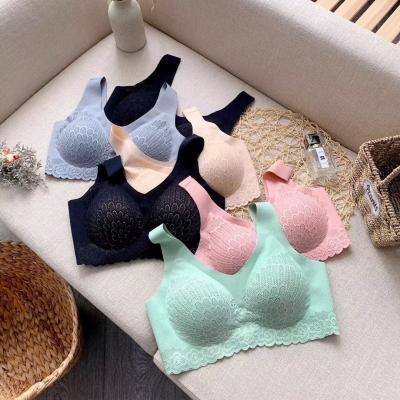 China Thailand Comfort One-Piece Hot Lift Up Lace Laser Cut Seamless Padded Sleep Bras Yoga Vest One Piece Tube Top Rimless Bra for sale