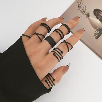 China New Romantic Hot Explosive Black Painting Rings Set Of 9 Cool Black Spring Rings for sale