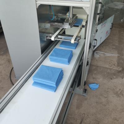 China Disposable Bed Sheet Nonwoven Fabric Table Cloth Medical Bed Draping Cutting And Folding Machine for sale