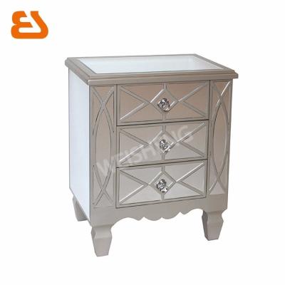 China PANEL 3 Drawer Champagne Silver Wood Trims Design Mirrored Bedside Table With Cutout Wood Decoration for sale