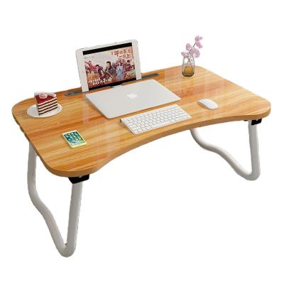 China Foldable Stable Wood Curved Bedroom Folding Desk With Laptop Slot for sale