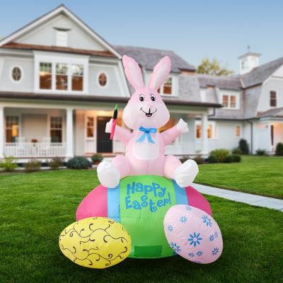 China Inflatable Decorations Best Selling LED Lights Easter Egg Indoor Outdoor Rotating Inflatable Rabbit Easter Decoration for sale