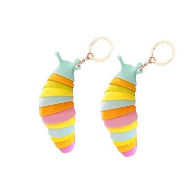 China Small Snail 3.8inch Ingot Caterpillar Decompression Toy Car Pendant Finger Plastic Rainbow Ingot Key Chain for sale