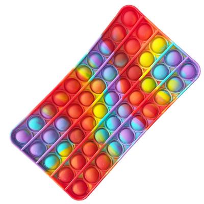 China AA091 Silicone Link Dye Silicone Stir Pen Pouch Kids Stress Reliver Educational Toys Soft Pencil Bag Rainbow Stirrer Pencil Case for sale