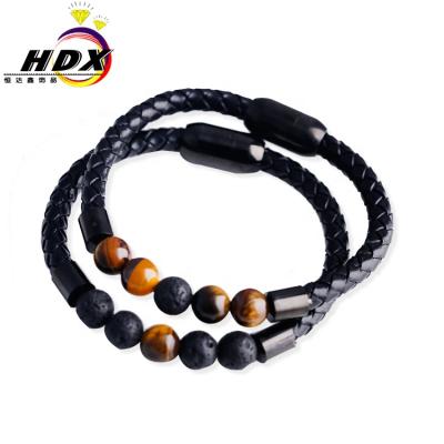 China CLASSIC Men's Magnet Woven Leather Rope Planet Volcanic Stone Hand Rope for sale