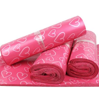 China Wholesale Package Pink Color With Heart Printing Express Bag Custom Mailing Bags for sale