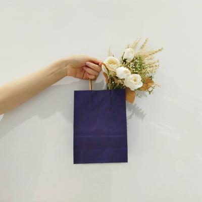 China Recycled Materials Shopping Kraft Paper Colorful Deep Blue Flower Bag With Handle for sale