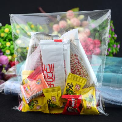 China Large Size Disposable 60 Micron Clear Poly Self Seal Opp Bags Clear Mailing Bags For Clothing for sale