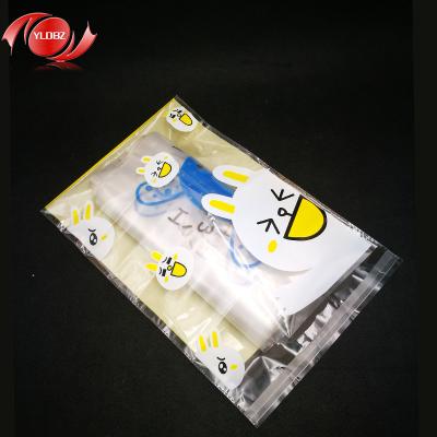 China Disposable Promotional Clothing Packing Clear Self Adhesive Plastic Bag en venta