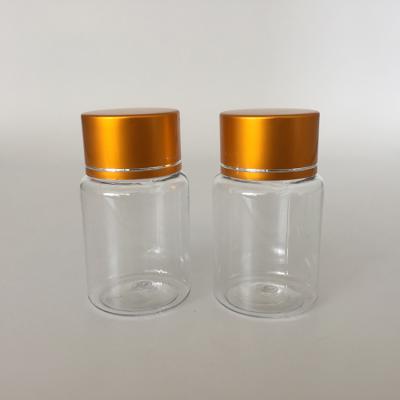 China Wholesale 20ml Plastic Clear PET Capsule Pill Bottle PET 20ml Clear Pill Bottle With Gold Sscrew Cap, Pharmaceutical Bottle Packing Container for sale