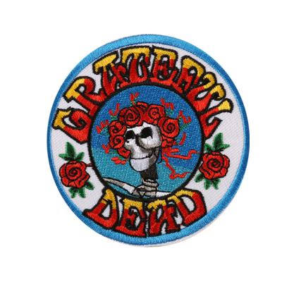 China High Quality Eco-Friendly Woven Skull Badge Applique Accessories Sew On Logo Patches For Clothing And Bags Custom Made for sale