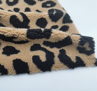 China Automatic upholstery soft touch leopard sherpa for garment / hometextiles for sale