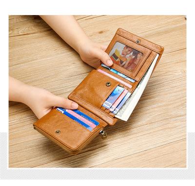 China Hot Selling Men's Wallets Purse Genuine Leather Men's Buckle Triple Fashion Zipper Coin Wallet Wholesale Pocket Wallets for sale