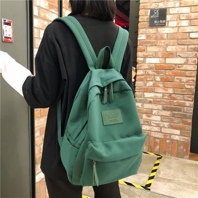 China Waterproof Kids Waterproof Laptop Large Capacity College Bags For Girls Backpack Candy Color Nylon School Bag for sale