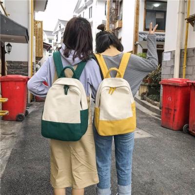 China Fashionable Schoolbag Waterproof New Canvas Color Block Women's Simple Candy Color Backpack for sale