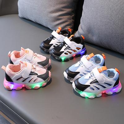 China 2021 Autumn Rubber Children's LED Lights Boys Girls Shoes Cartoon Running Shoes Baby Sports Luminous Shoes for sale