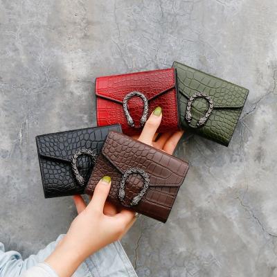 China Simple Anti-theft Pattern Ladies Crocodile Wallet Short Women's Clutch Bag Wallet Coin Card Purse for sale