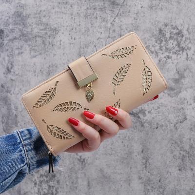 China Fashion Anti-theft Long Clutch Bag Hollowing Out Leaf Zipper Sequined Decorative Latch Women Clutch Leather Wallet for sale