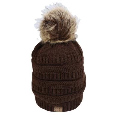 China JOINT Logo Cheap Custom Winter Knitted Hats for sale