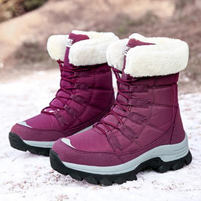 China Factory direct wholesale winter sheepskin fur warm boots anti-slip waterproof furry snow boots for women for sale