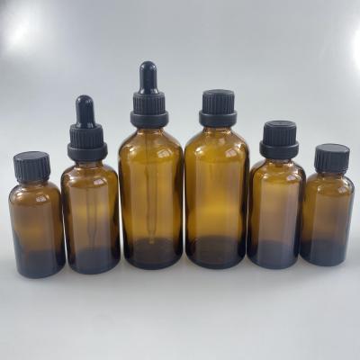 China 30ml 60ml 120ml Amber Non Refillable Clear Blue Green Round Dropper Bottle Essential Oil Glass Bottles for sale