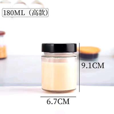 China Freshness Preservation Cheap Price Multiple Sizes Glass Honey Jar With Black Metal Lids for sale