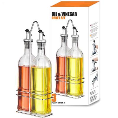 China Sustainable Oil Vinegar Glass Bottle Set With Metal Holder 8 oz Salad Dressing Bottle With Silicone Lid for sale