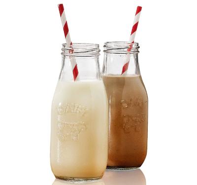 China High Quality Steamable 11oz Clear Glass Milk Bottle With Metal Lids And Straws For Juice for sale