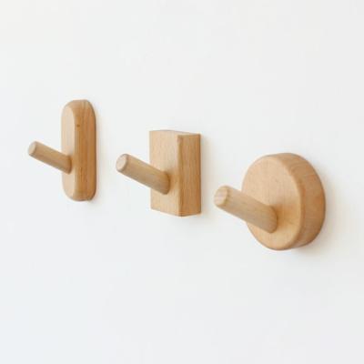 China Small Viable Modern Simple Natural Strong Adhesive Sticky Key Hooks Solid Wood Wall Hooks for sale