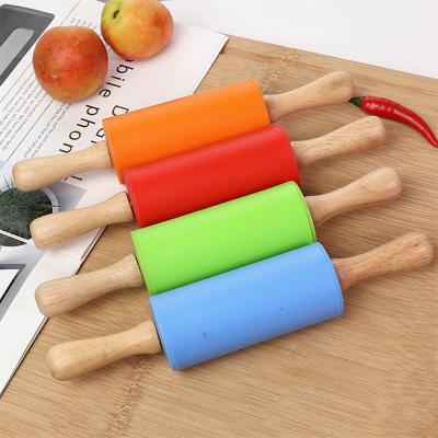 China Food Grade Christmas Pretty Design Sustainable Kitchen Accessories Fit Colorful Natural Solid Wood Dumpling Cake Baking Pin for sale