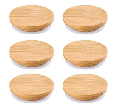 China Non Spill Tea Bottle Sealed Glass Lid Storage Jar Bamboo Wooden Lid Wholesale Logo for sale