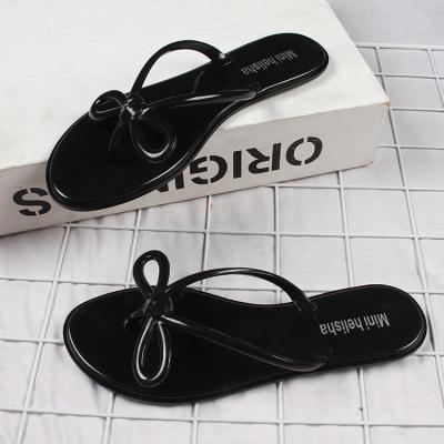 China Indoor fashion trend thin-soled butterfly women non-slip sandals for women flip-flop slippers for sale