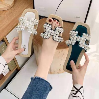 China Fashion trend fashion indoor and outdoor non-slip masonry sandals women's decorative slippers for sale