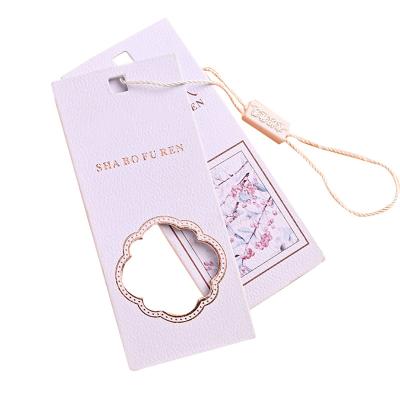 China Sustainable Wholesale Name Custom Women Luggage Clothes Brand Reflective Label For Clothing Paper Hang Tags for sale