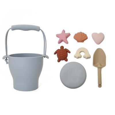 China 2021 Silica Gel Beach Games Sand Toys Silicone Bucket 7pcs Silicone Sand Bucket Outdoor Colorful Beach Set for sale