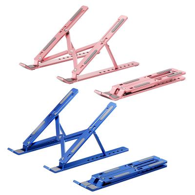 China Popular Adjustable Foldable Portable Notebook Stand MC Notebook Stand Small Notebook Bracket Riser Computer Stand for sale