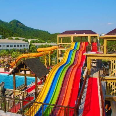 China Outdoor Fiberglass COWBOY Exciting Large Fiberglass Aqua Park Pool Theme Park Rainbow Water Slides for sale