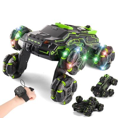 China Hand control 2.4G Six-Wheeled Full Function Radio Control Rc Stunt Car Toys Hand Controlled Gesture With Music And Light Boy Children Toy Car for sale