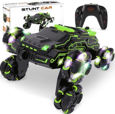 China Hand control 2023 New Style Best rc Car Drift 4wd Tries Stunt Hand Gesture Watch Remote Control Cars with LED Colorful Lights Music Spray for sale