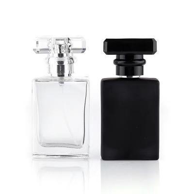 China 50ml 100ml cosmetic empty square glass perfume bottle spray and box with matel spray cap for sale