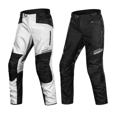 China Professional Quality Waterproof Motorcycle Pants Waterproof CE Motorcycle Anti-Collision Pants Warm Up Riding Protective Clothing for sale