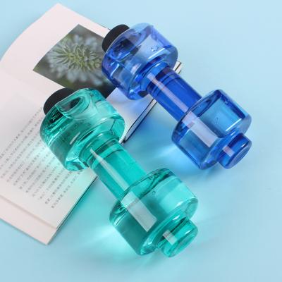 China 550ml Dumbbell Water Bottle Contemporary Plastic Fitness Shaker Dumbbell Water Bottle for sale