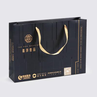 China Custom Recycled Materials Luxury Black Clothing Store Retail Gift Carry Bags Boutique Shopping Paper Bags With Your Own Gold Logo for sale